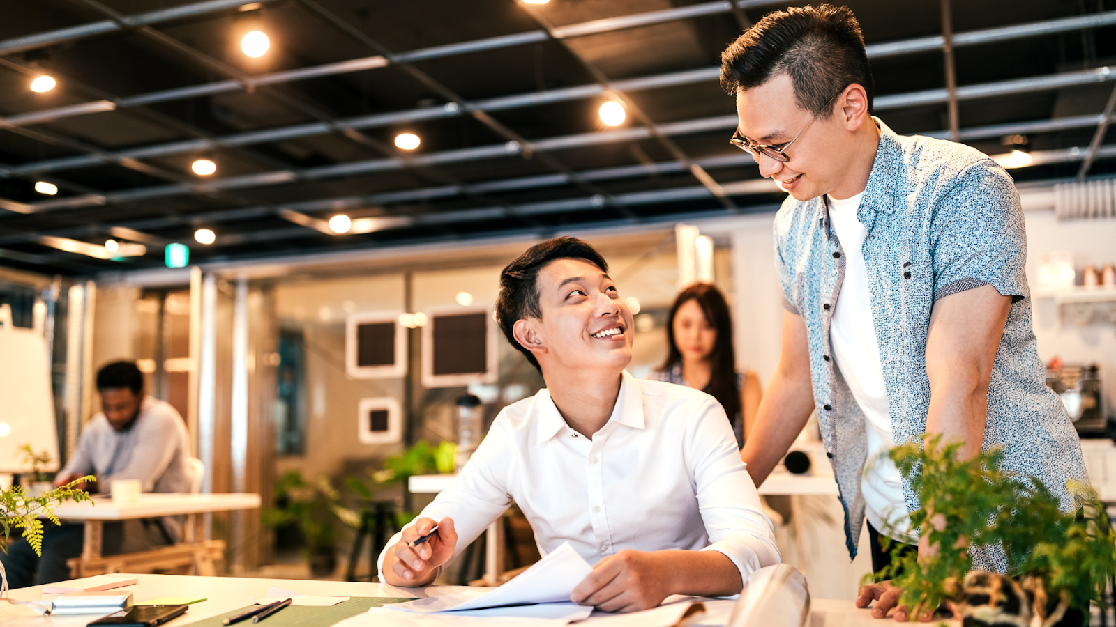 An employer offering guidance to an office temp worker.