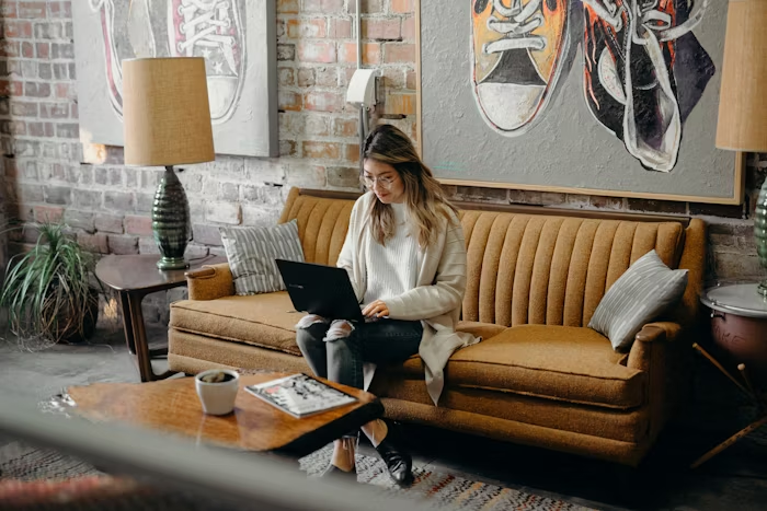 Executive recruiter analyzing AI-powered candidate insights on a modern laptop interface in a sleek office environment.